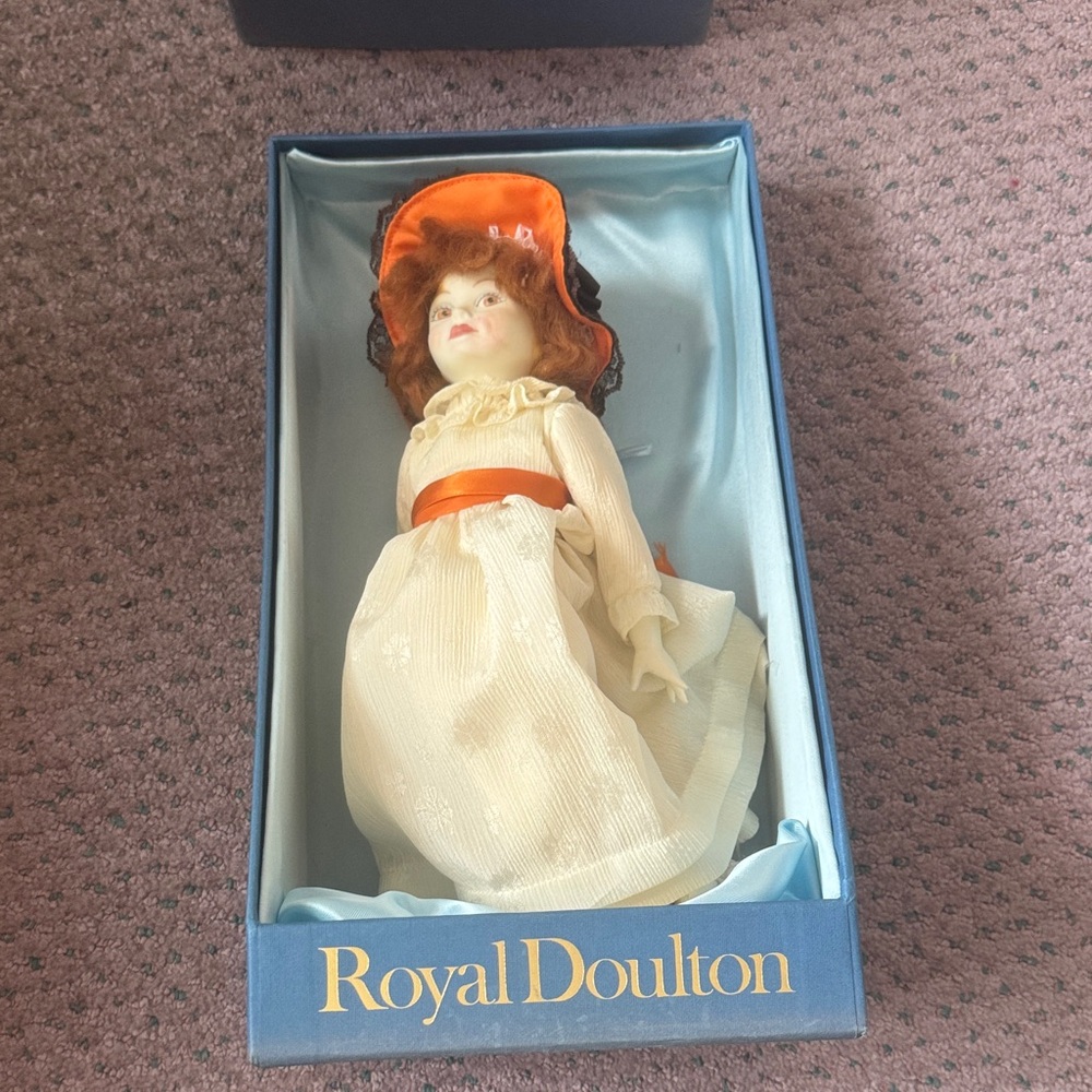 Royal Doulton Doll with Cream Dress and Orange Hat
